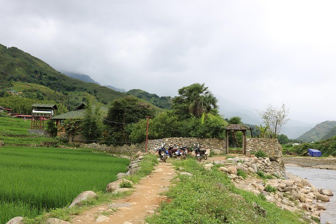 2 days 3 Nights Sapa Trekking Tour by Night Train from Hanoi - Morning arrival at Lao Cai and the climb toward Sapa