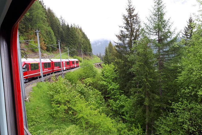 Bernina Red Train, Swiss Alps & St Moritz From Milan - Boarding the Bernina Red Train at St. Moritz