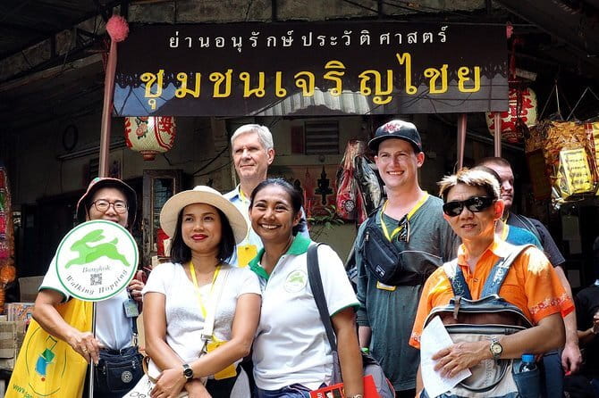 Day Trip to Bangkok Floating Market & Maeklong Railway - Watching the train at Maeklong Railway Market