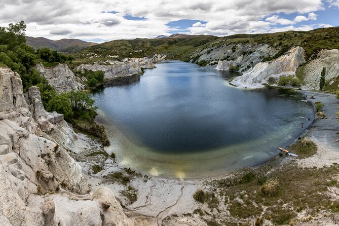 Dunedin to Queenstown One Way Tour Including Taieri Gorge Train - Changing trains for a Central Otago road trip