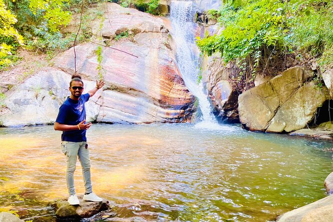 Ella Day Trip with Train Ride Waterfalls and Tea Factory Tour - Ravana Falls gives the day an easy first landmark