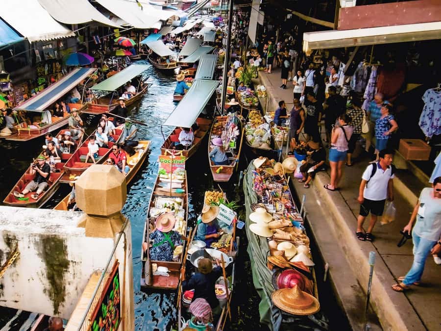 From Bangkok: Maeklong Railway and Floating Market Day Tour - The railway market spectacle comes first