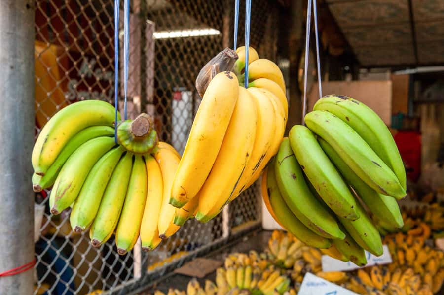 From Bangkok: Maeklong Railway and Floating Market Food Tour - Transport, timing, and meeting details