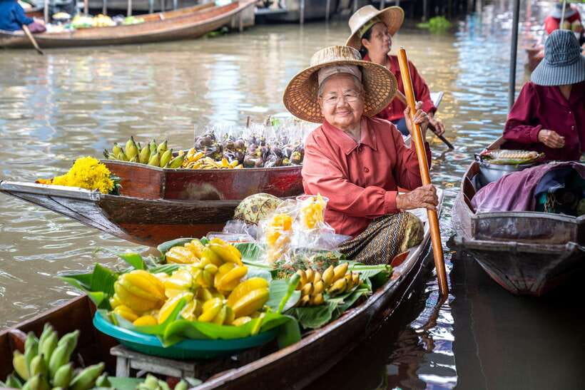 From Bangkok: Railway & Damnoen Saduak Floating Market Tour - The canal journey to Damnoen Saduak