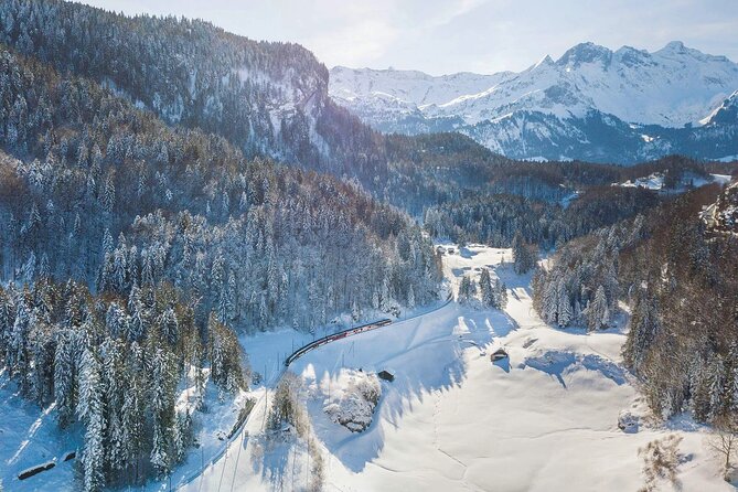 From Basel: Premium Panoramic train, Lucerne & Interlaken Tour - Lucerne’s Chapel Bridge and lakefront setting