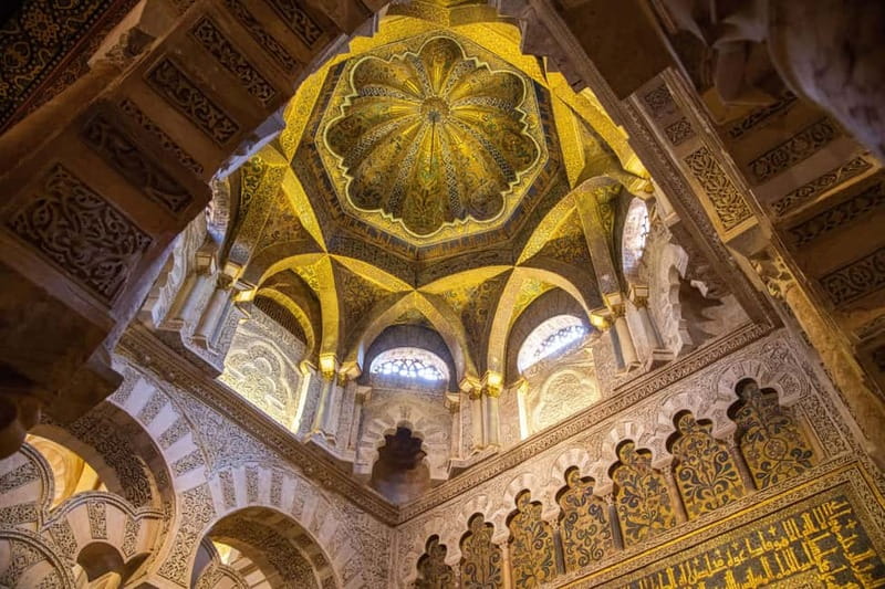 From Madrid: Cordoba and Mosque Day Trip by High-Speed Train - Walking across the Roman Bridge