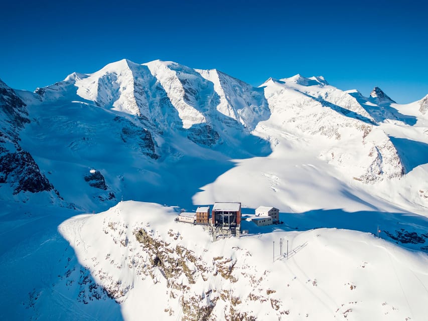 From Milan: Bernina Red Train & Lunch with Mountain Views - A traditional Pizzoccheri lunch above the valleys