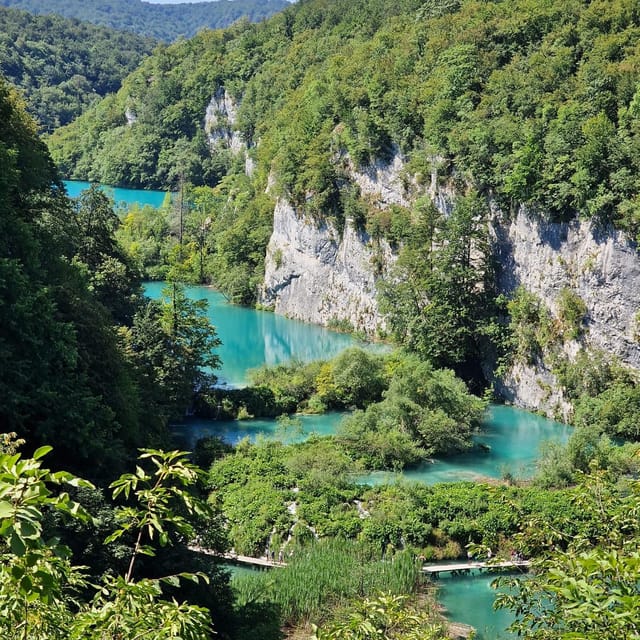 From Zadar: Plitvice Lakes Guided Tour with Boat & Train - The Zadar pickup and the two-hour coach ride