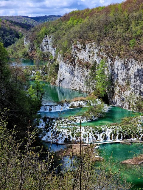 From Zadar: Plitvice Lakes Tour with Boat & Train Ride - Entering Plitvice with the ticket handled
