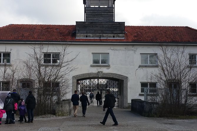 Guided Dachau Concentration Camp Memorial Site Tour with Train from Munich - The barracks, bunker, and maintenance building