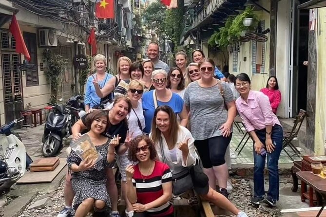 Hanoi Michelin Star Street Food Walking Tour & Train-Street - Starting at Hang Mam Street and the first Hanoi bites
