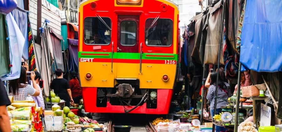 Hua Hin: Maeklong Railway & Amphawa Floating Markets Tour - The train that shares its tracks with Maeklong Market