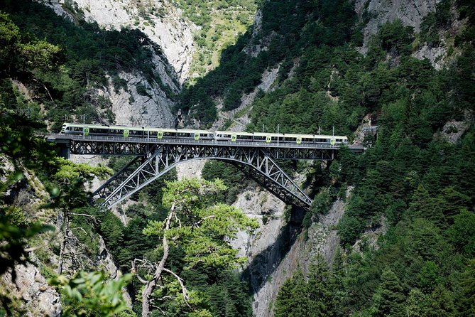 Interlaken and the Green Train of Swiss Alps Day Trip from Milan - Cruising Lake Thun to Interlaken
