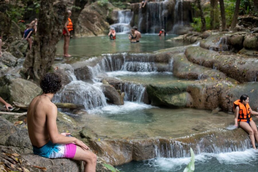 Kanchanaburi: Erawan Waterfall & Train Full-Day Tour - Walking the seven tiers of Erawan Waterfall