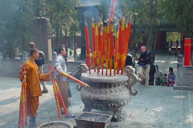 Luoyang & Shaolin Temple Day Trip from Xian by High-speed Train - Longmen Grottoes: stone faces across four centuries
