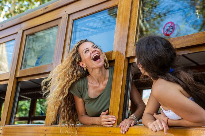Mallorca in One Day Sightseeing Tour with Boat Ride and Vintage Train - Port de Sóller and the orange-grove tram