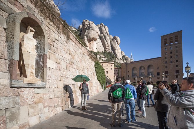 Montserrat with Cog-Wheel Train & Black Madonna Priority Access - The Barcelona meeting point and one-hour coach ride