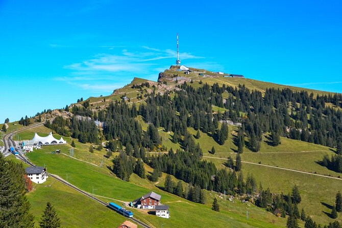 Mount Rigi Tour from Lucerne Historic Train and Boat Ride - Riding the Rigi railway toward the summit