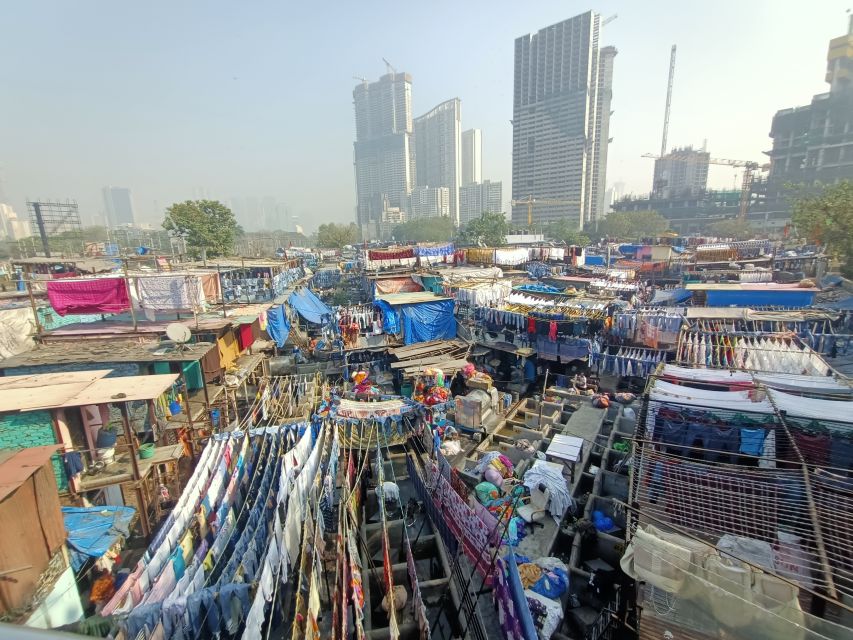 Mumbai: Dhobi Ghat Tour with Dharavi and Train Ride Options - Why Dhobi Ghat is worth your time