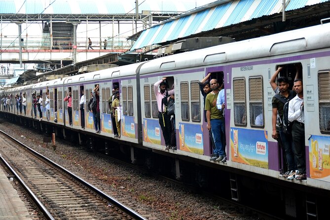 Mumbai Slum Tour with Dhobi Ghat Laundry & Train Ride Tour - Dhobi Ghat: Mumbai’s open-air laundry