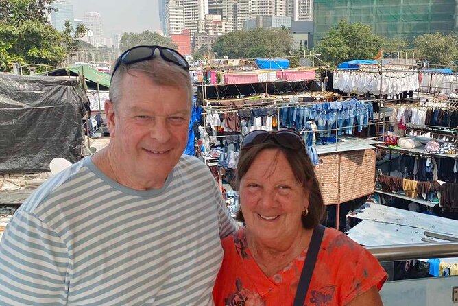Mumbai Slum Tour with Dhobi Ghat Laundry & Train Ride Tour - Small businesses, tight spaces, and useful context