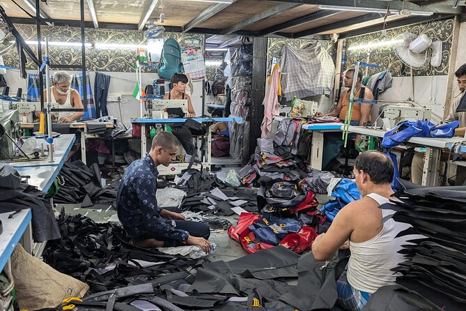 Mumbai Slum Tour with Dhobi Ghat Laundry & Train Ride Tour - Two hours inside Dharavi