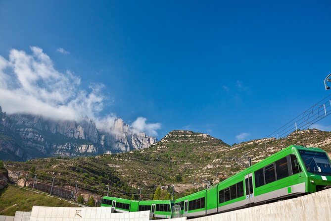 Panoramic Barcelona and Montserrat with Cog-Wheel Train - Montjuïc combines views, history, and the 1992 Olympics