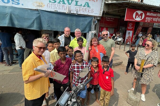 Primmum Mumbai Sightseeing With Local Train Ride Experience - Rajabai Clock Tower and the Gothic city