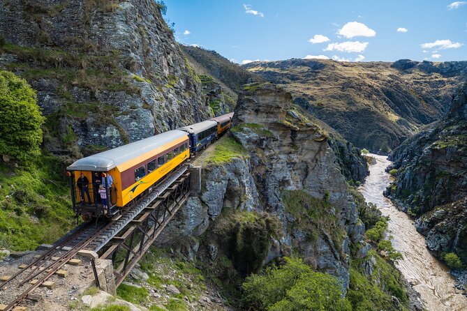 Queenstown to Dunedin with Taieri Gorge Train One-Way Tour - Two hours through the Taieri Gorge