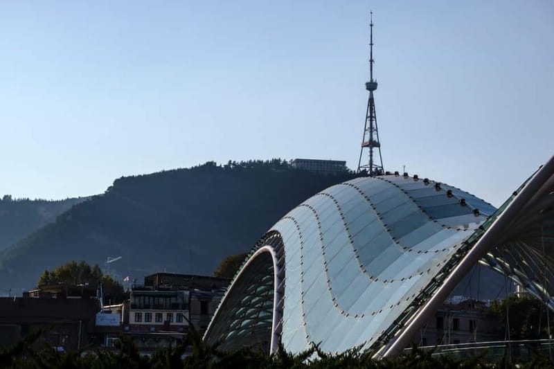 Tbilisi: Old Town Sights & Funicular Ride to Mtatsminda Park - Walking through Rike Park, Abanotubani, and the Bridge of Peace