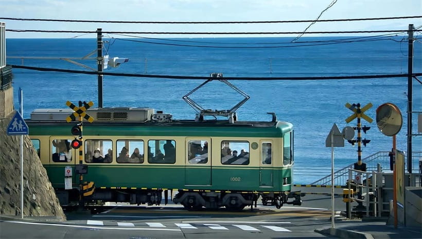 Tokyo: Kamakura & Enoshima Day Tour with Pickup & Train Ride - The Enoden train along the Shonan coast