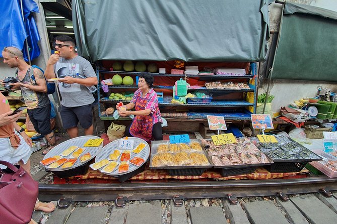 Train & Floating Market Food Adventure + Scenic train ride - Snacks, fruit, and trying something unfamiliar